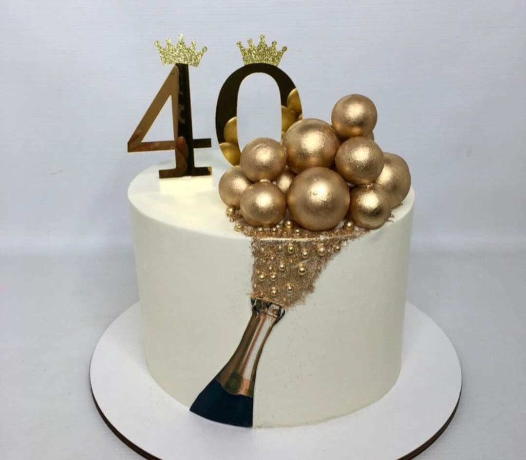 Jaytal House Of Cake champagne gold balls cake